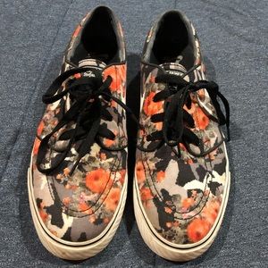 Orange Nike Zoom Stefan’s Janoski low tops.